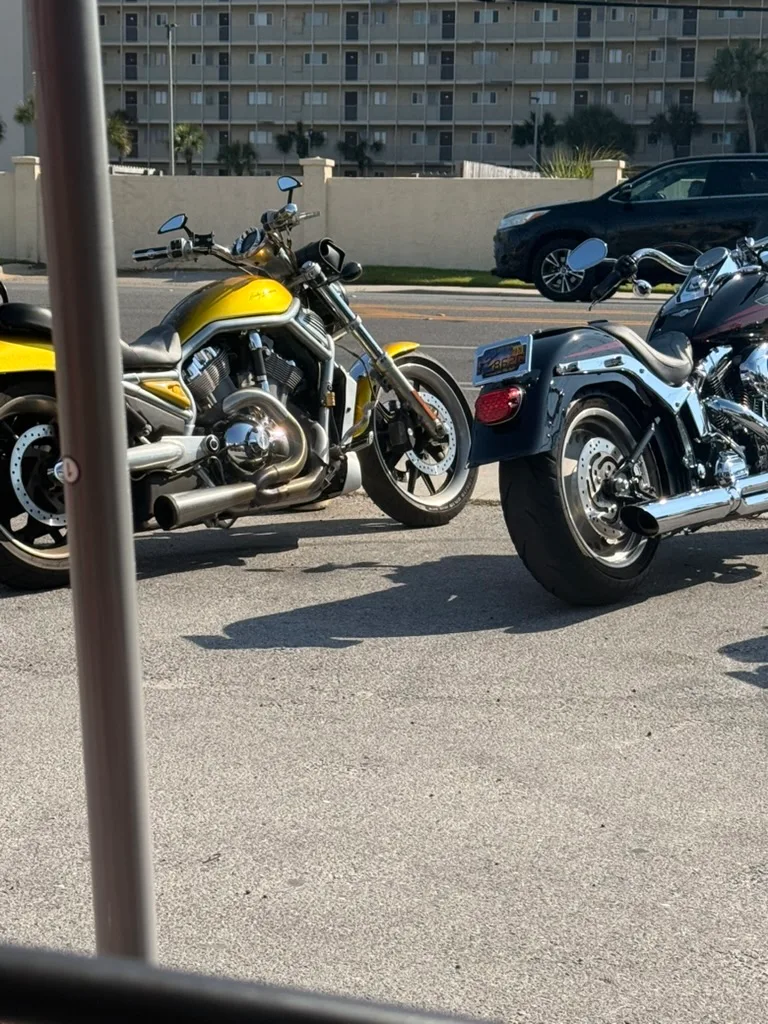 Motorcycles parked at Buster's Beer and Bait patio, Panama City Beach